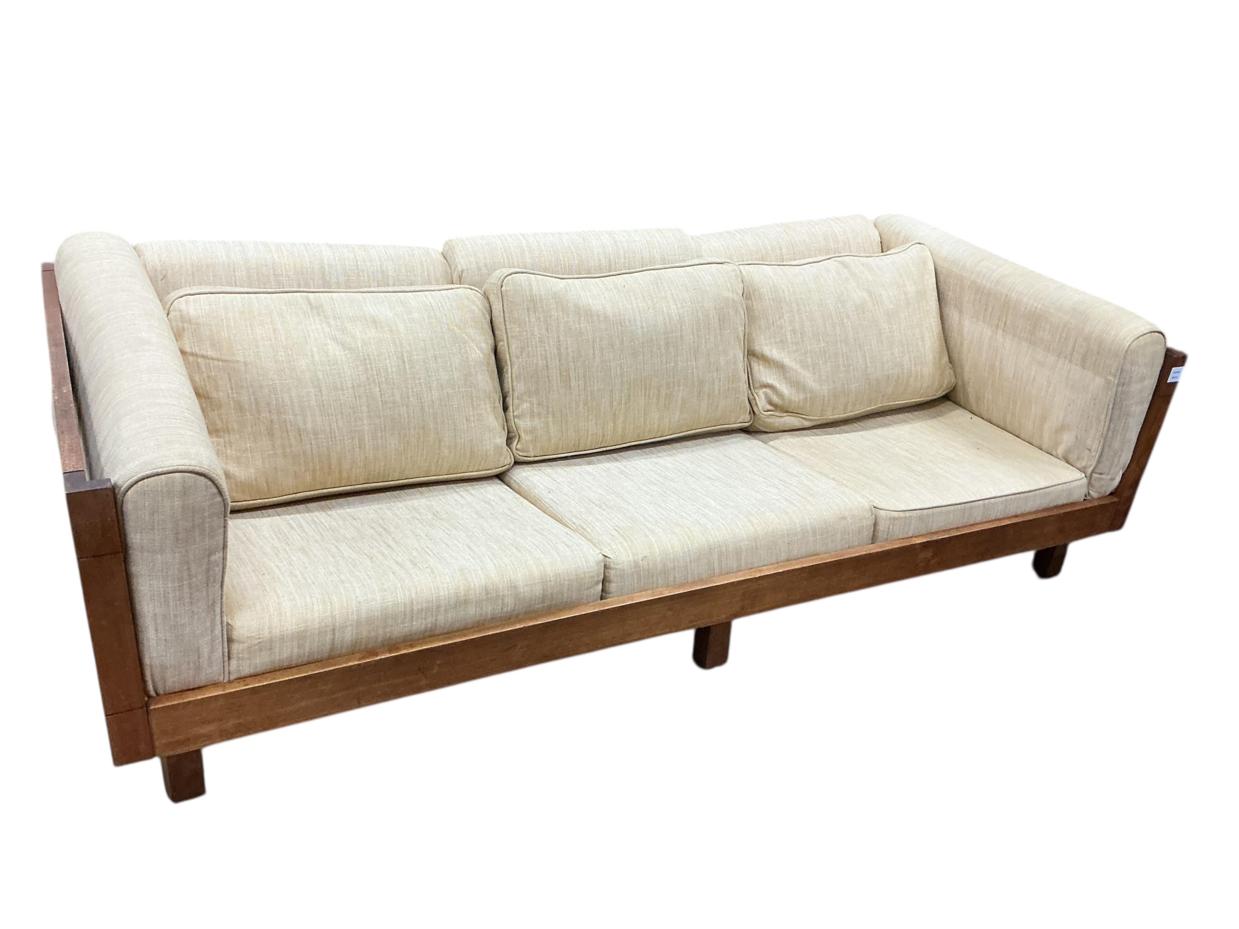 A mid century teak Bastiano style three seater settee, width 199cm, depth 86cm, height 84cm